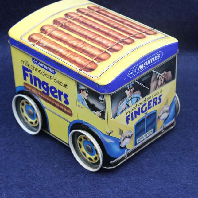 McVitie's Fingers biscuit tin shaped like a vintage van on a blue background