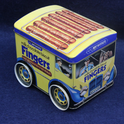 Toy truck-shaped container with McVitie's Fingers branding on a blue background