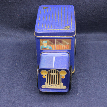 Blue vintage-style toy truck on a dark blue background