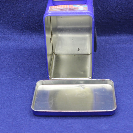 Metallic object with blue casing on a blue background