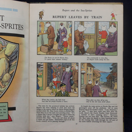 Comic page from 'Rupert' showing Rupert leaving by train with illustrations and text.