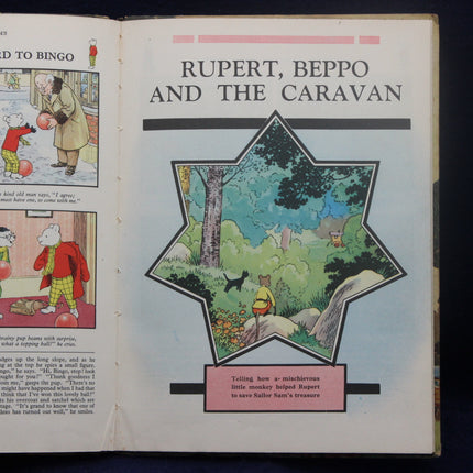 Open book with illustrations of Rupert Bear and text about 'Rupert, Beppo and the Caravan'.