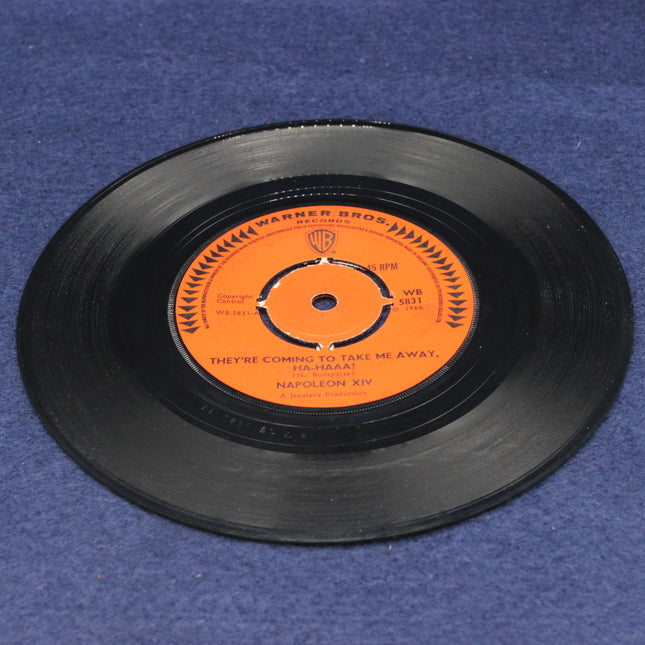 Napoleon XIV – They’re Coming To Take Me Away, Ha‑Haaa!  Vinyl record with orange label on a blue background