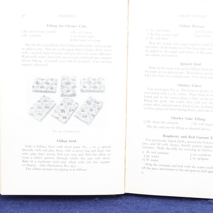 Open book with recipe pages and illustrations of cake fillings.