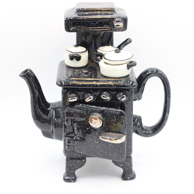 Paul Cardew Design Large Country Kitchen Stove Teapot with black speckled enamel stove-shaped teapot with cream-colored pots on top, photographed against a plain white background.
