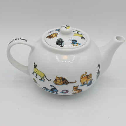 A white ceramic teapot decorated with colorful illustrations of various cat breeds, shown on a neutral light gray background.