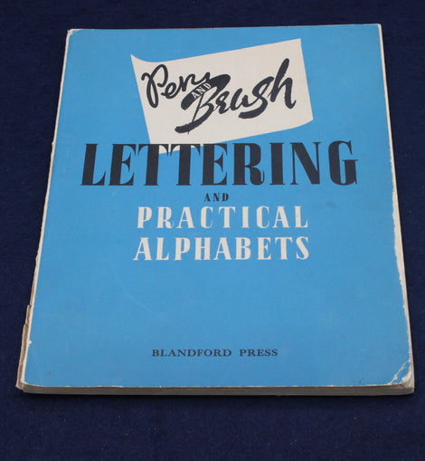 Book titled 'Lettering and Practical Alphabets' by Blandford Press on a blue background