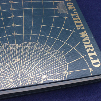 Blue notebook with world map design on a blue background
