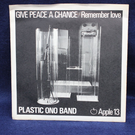 Album cover with text 'Give Peace a Chance / Remember Love' and 'Plastic Ono Band Apple 13' on a blue background