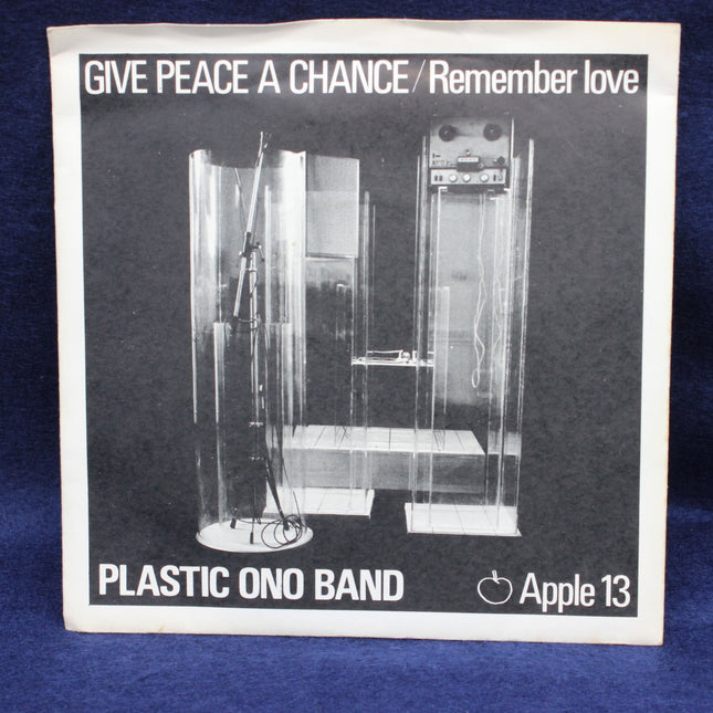 Album cover with text 'Give Peace a Chance / Remember Love' and 'Plastic Ono Band Apple 13' on a blue background