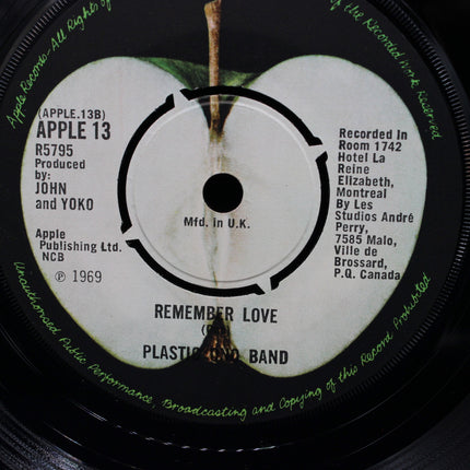 Record label with text and an apple illustration