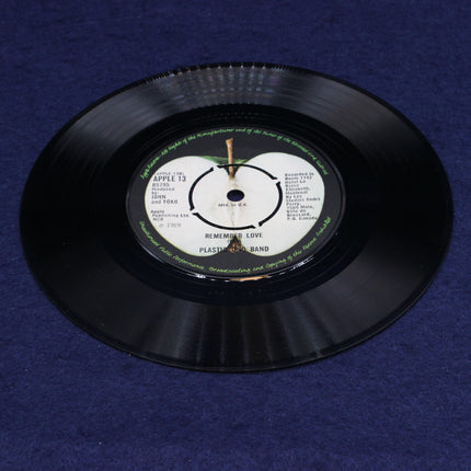 Vinyl record with a label on a blue background