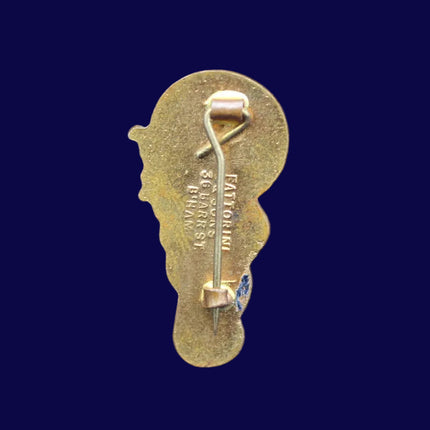 Robertson’s 1970s Golly Bagpiper Badge — Fattorini Backstamp