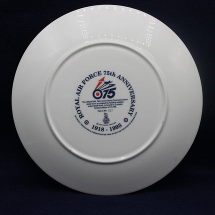 White disc with Royal Air Force 75th Anniversary logo on a black background