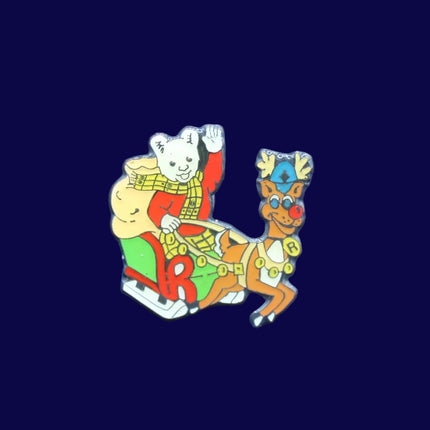 Rupert the Bear Christmas Sleigh Badge — Festive Character Pin