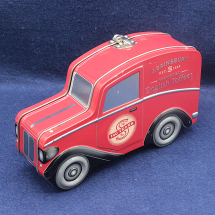 Red model of a Sainsbury's delivery van on a blue background