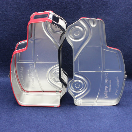 Two clear plastic car floor mats with red edges on a blue background