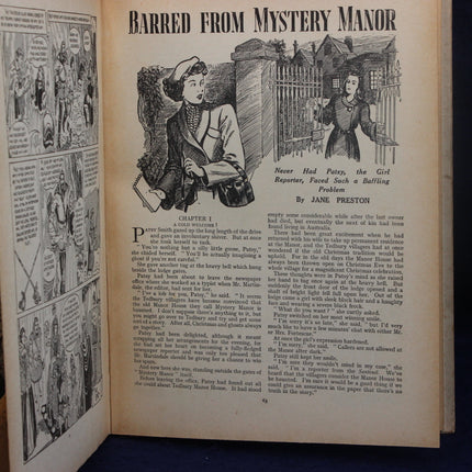 Open book with black and white illustrations and text on a dark background