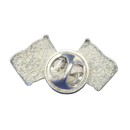 Silver badge with two flags on a blue textured background