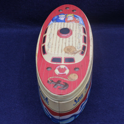 Decorative box shaped like a ship on a blue background