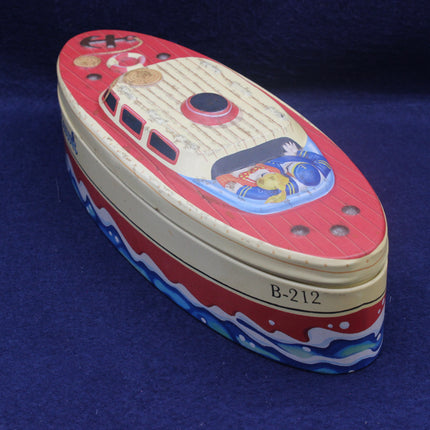 Toy boat with colorful design on a blue background
