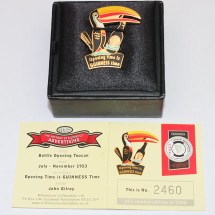 Black box with a toucan design and a Guinness-themed business card on a white background