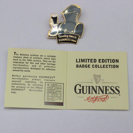 Guinness limited edition badge collection with a badge and display card on a gray background
