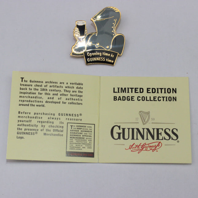 Guinness limited edition badge collection with a badge and display card on a gray background