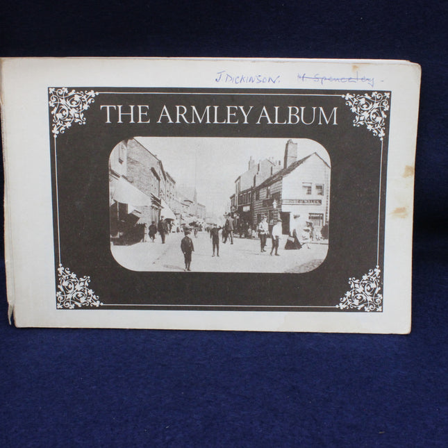 Cover of 'The Armley Album' with a black and white photo of a street scene.