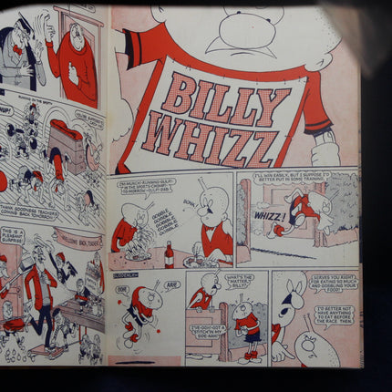 Comic book page featuring the character Billy Whizz with various panels and text.