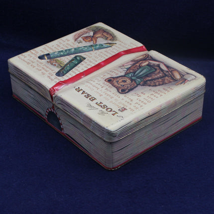 Vintage-style book with illustrations of a bear and tools on a dark blue background