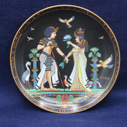 The Marriage of Tutankhamen Decorative plate with Egyptian-themed design on a blue background