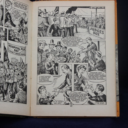 Comic book page with black and white illustrations and text on a dark background