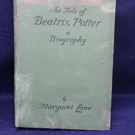 Book titled 'The Tale of Beatrix Potter: A Biography' by Margaret Lane on a purple background