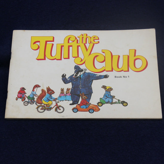Book cover of 'The Tuffy Club' with cartoon characters on a dark background