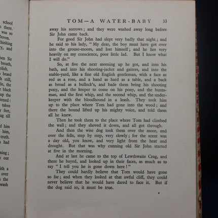 Page from a book titled 'Tom-A Water-Baby' with text on a white background