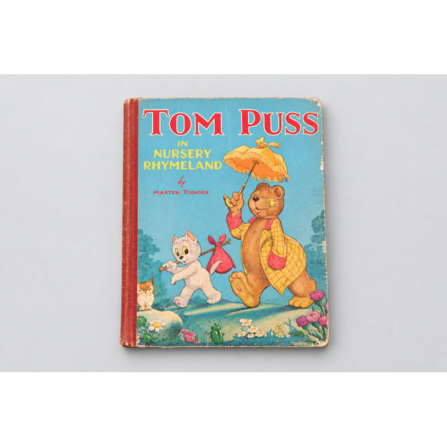 Tom Puss in Nursery Land Annual on a green background