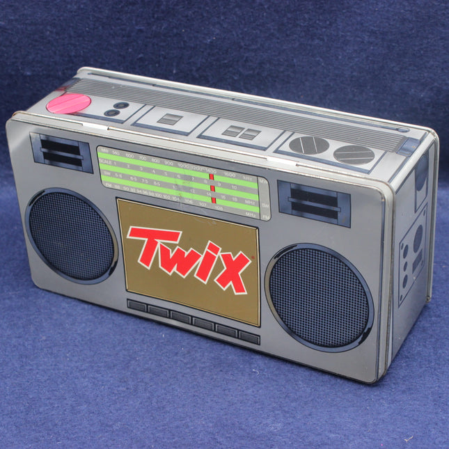 Twix candy bar packaging designed like a retro boombox on a blue background