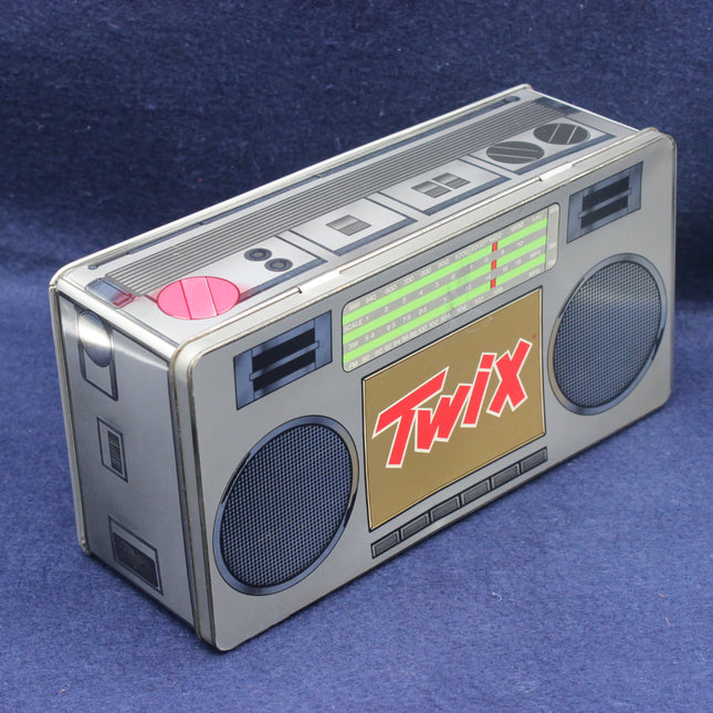 Twix candy bar in the shape of a boombox on a blue background