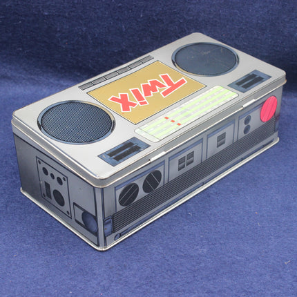 Twix candy bar packaging designed like a retro radio on a blue background