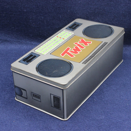 Twix candy bar packaging with a retro console design on a blue background