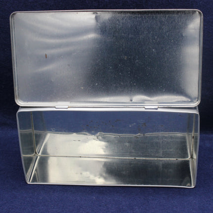 Clear plastic box with a lid on a blue background