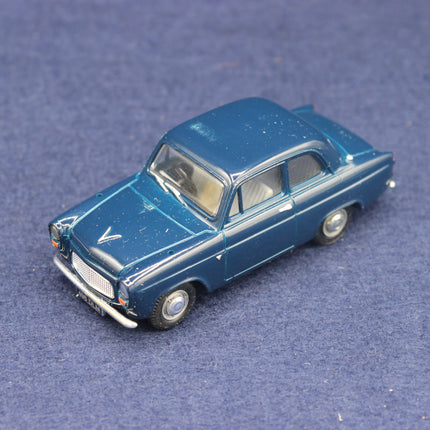 Model of a blue vintage car on a textured blue surface