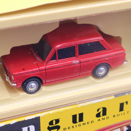 Red model car on a yellow background with 'n guar' branding.