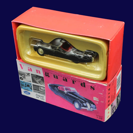 Model car in a red and yellow box with 'Vanguards' branding on a dark background