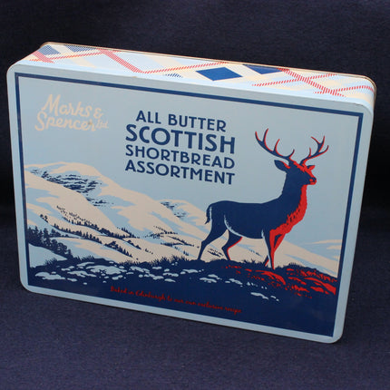 Vintage Scottish Shortbread tin on a blue background