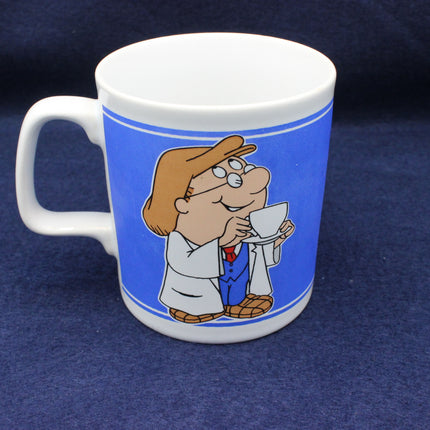 Mug with a cartoon Tetley Tea Folk holding a cup on a blue background