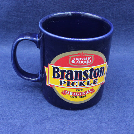 Blue mug with Branston Pickle label on a blue background