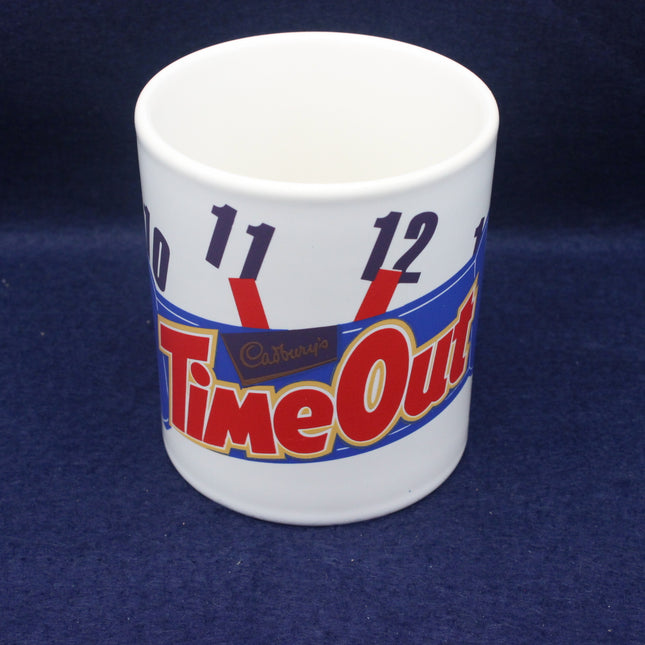Vintage Cadbury's Time Out Collectors Mug on a blue background