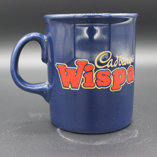 Blue mug with 'Cadbury Wispa' branding on a gray background